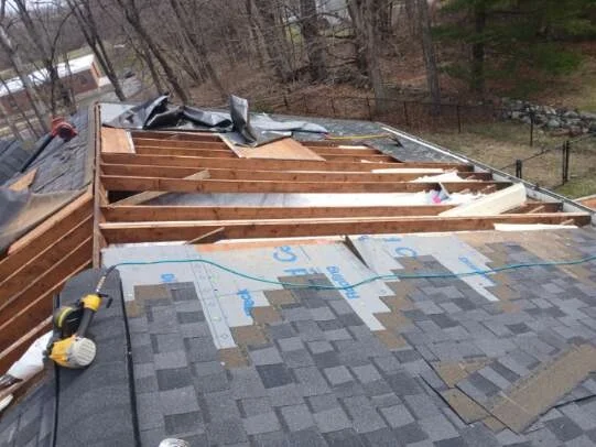 Roof decking and framing repair in progress